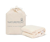 Naturepedic Organic Waterproof Protector Pad on bed – breathable, GOTS certified organic cotton mattress protector for babies and adults.